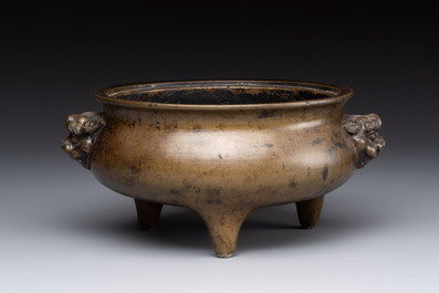 Two Chinese bronze censers with lion-form handles, Zi Sun Bao Zhi 子孫保之 mark, 19th C.