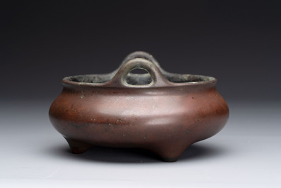 A Chinese bronze tripod censer, Xuande mark, 17/18th C.