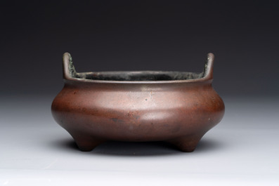 A Chinese bronze tripod censer, Xuande mark, 17/18th C.