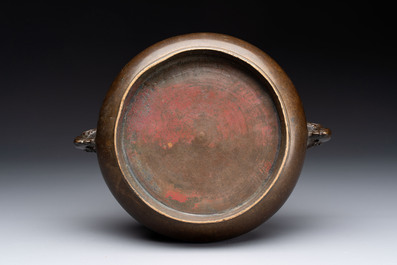 Two Chinese bronze censers with lion-form handles, Zi Sun Bao Zhi 子孫保之 mark, 19th C.
