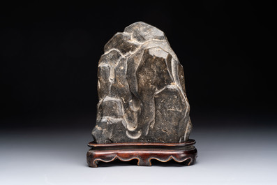 A Chinese Lingbi stone scholar's rock on wooden stand, Yun Tai 雲台 mark, 19/20th C.