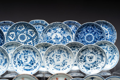 26 Chinese blue, white and Imari-style cups and 28 saucers, Kangxi and later