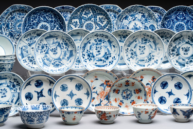 26 Chinese blue, white and Imari-style cups and 28 saucers, Kangxi and later