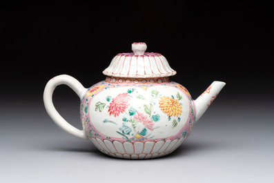 A Chinese famille rose moulded teapot and stand with floral design, Yongzheng/Qianlong