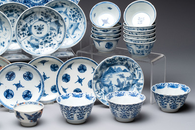26 Chinese blue, white and Imari-style cups and 28 saucers, Kangxi and later