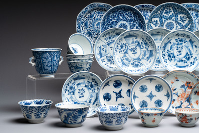 26 Chinese blue, white and Imari-style cups and 28 saucers, Kangxi and later
