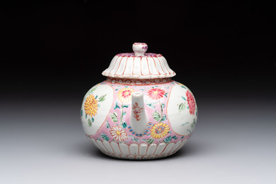 A Chinese famille rose moulded teapot and stand with floral design, Yongzheng/Qianlong