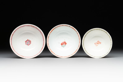 Seven Chinese famille rose cups and saucers, Yongzheng/Qianlong