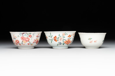 Seven Chinese famille rose cups and saucers, Yongzheng/Qianlong