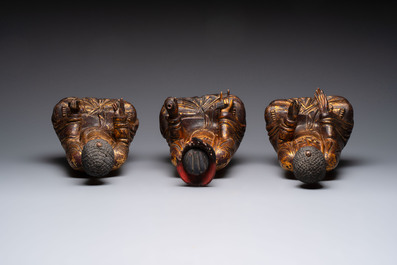 A set of three Chinese or Vietnamese gilt-lacquered wooden sculptures of Buddha, 18/19th C.