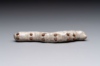 A rare Chinese ge-type model of a silkworm on wooden stand, 18th C.