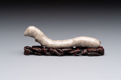 A rare Chinese ge-type model of a silkworm on wooden stand, 18th C.