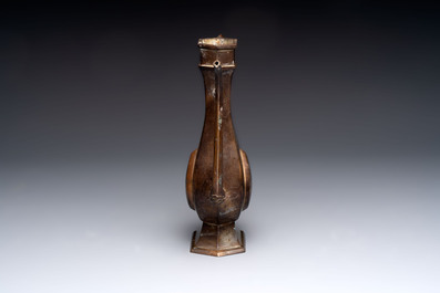 A Chinese bronze vase and ewer, and a Japanese vase, 18/19th C.