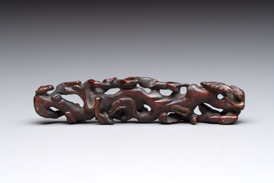 A rare Chinese ge-type model of a silkworm on wooden stand, 18th C.