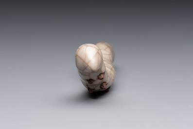 A rare Chinese ge-type model of a silkworm on wooden stand, 18th C.