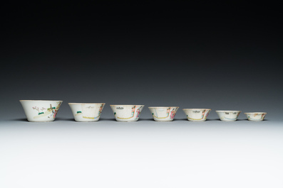 A set of seven Chinese famille rose nesting bowls with narrative design, Daoguang