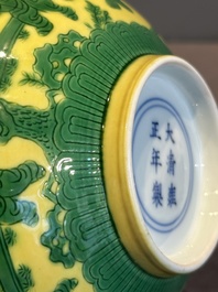 An imperial Chinese green-enamelled yellow-ground 'playing boys' bowl, Yongzheng mark and of the period