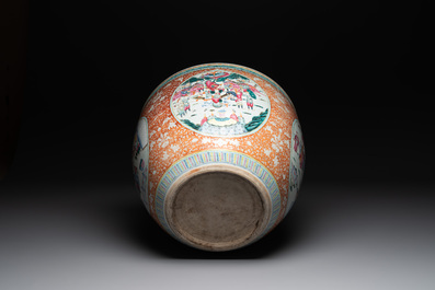 A large Chinese famille rose coral-red-ground fish bowl with narrative design, 19th C.