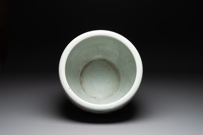 A large Chinese famille rose coral-red-ground fish bowl with narrative design, 19th C.