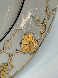 A Chinese famille rose semi-eggshell plate with a lady on horseback and attendants, Yongzheng
