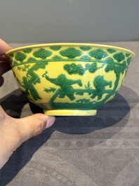 An imperial Chinese green-enamelled yellow-ground 'playing boys' bowl, Yongzheng mark and of the period