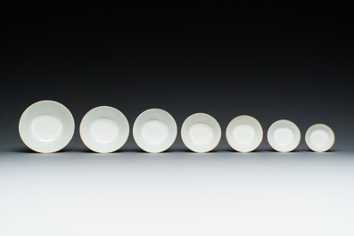A set of seven Chinese famille rose nesting bowls with narrative design, Daoguang