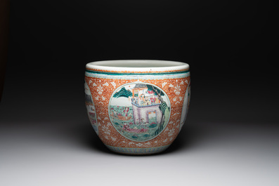 A large Chinese famille rose coral-red-ground fish bowl with narrative design, 19th C.
