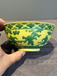 An imperial Chinese green-enamelled yellow-ground 'playing boys' bowl, Yongzheng mark and of the period