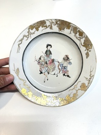 A Chinese famille rose semi-eggshell plate with a lady on horseback and attendants, Yongzheng