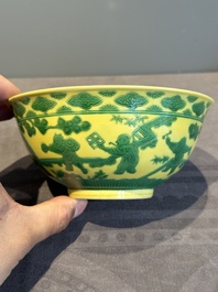 An imperial Chinese green-enamelled yellow-ground 'playing boys' bowl, Yongzheng mark and of the period