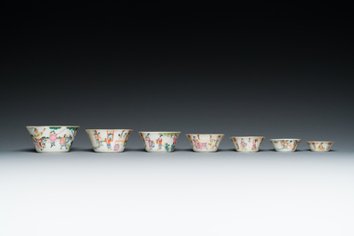 A set of seven Chinese famille rose nesting bowls with narrative design, Daoguang