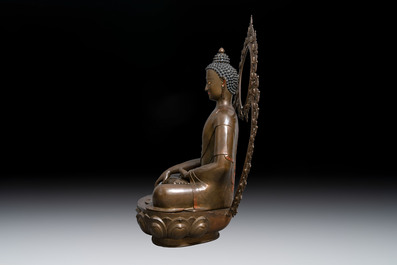 An exceptionally large Nepalese bronze figure of Buddha, 19th C.