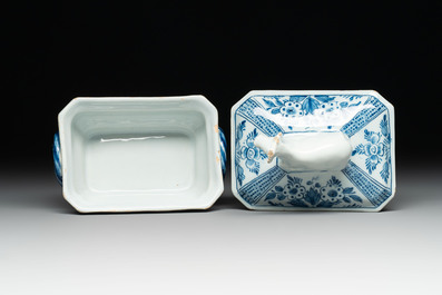 A pair of blue and white Dutch Delft cow-topped butter tubs and covers, 18th C.