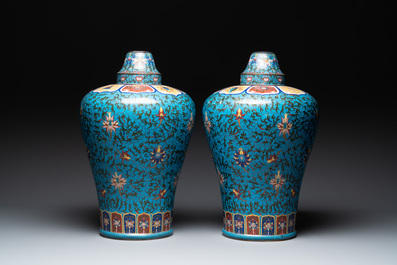 A pair of large Chinese cloisonn&eacute; 'lotus scroll' 'meiping' vases and covers, Republic
