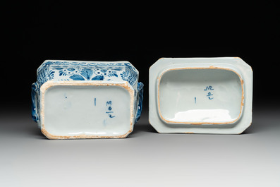 A pair of blue and white Dutch Delft cow-topped butter tubs and covers, 18th C.