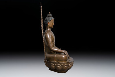 An exceptionally large Nepalese bronze figure of Buddha, 19th C.