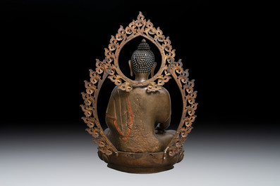 An exceptionally large Nepalese bronze figure of Buddha, 19th C.