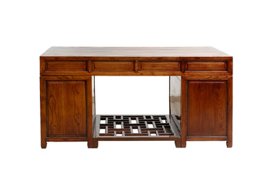 A Chinese wooden desk with drawers and a footrest, 19/20th C.