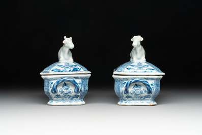 A pair of blue and white Dutch Delft cow-topped butter tubs and covers, 18th C.