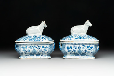 A pair of blue and white Dutch Delft cow-topped butter tubs and covers, 18th C.