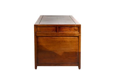 A Chinese wooden desk with drawers and a footrest, 19/20th C.