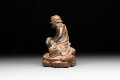 A Chinese bamboo figure of Luohan, a ruyi group on wooden stand and a hongmu stand, 19/20th C.