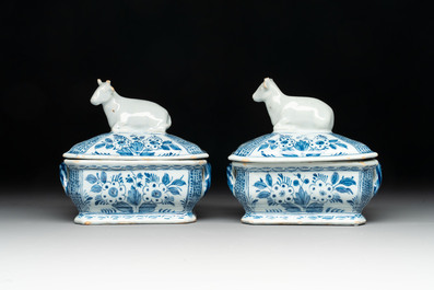 A pair of blue and white Dutch Delft cow-topped butter tubs and covers, 18th C.