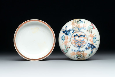 A diverse group of 12 Chinese snuff bottles and three covered seal paste boxes, Qianlong and Daoguang marks, 19th C.
