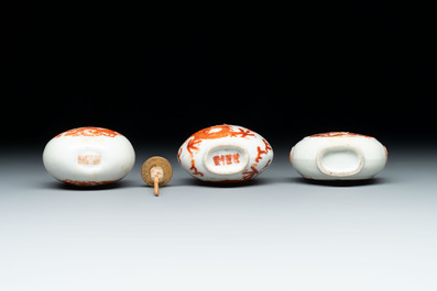 A diverse group of 12 Chinese snuff bottles and three covered seal paste boxes, Qianlong and Daoguang marks, 19th C.