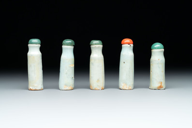A diverse group of 12 Chinese snuff bottles and three covered seal paste boxes, Qianlong and Daoguang marks, 19th C.