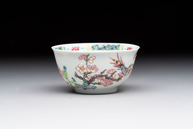 A set of six Chinese famille rose cups and saucers with birds among flowering branches, Yongzheng/Qianlong