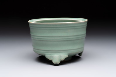 A Chinese Longquan celadon cylindrical tripod censer with &lsquo;trigrams&rsquo; design, Yuan/Ming