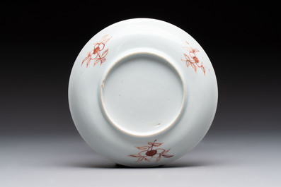 A set of six Chinese famille rose cups and saucers with birds among flowering branches, Yongzheng/Qianlong