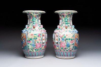 A pair of Chinese famille rose vases with narrative design on wooden stands, 19th C.